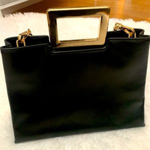 Beautiful leather black and gold Michael Kors hand bag (satchel).